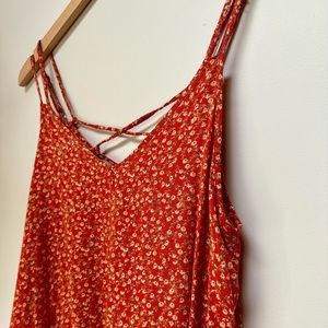 Red babydoll floral shirt.